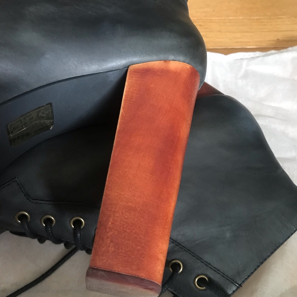 Iconic black leather Jeffrey Campbell Lita boots.